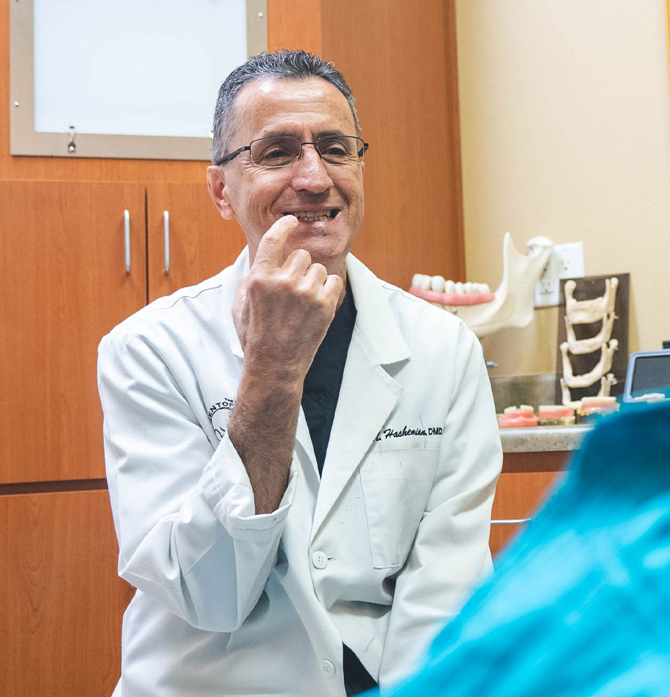 doctor explaining dental procedure to patient within the dental practice