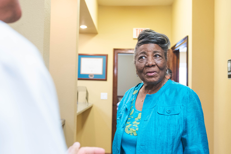 patient and doctor going over dental procedure information
